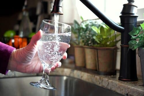 filling-a-glass-of-water-from-the-sink-with-reverse-osmosis-system